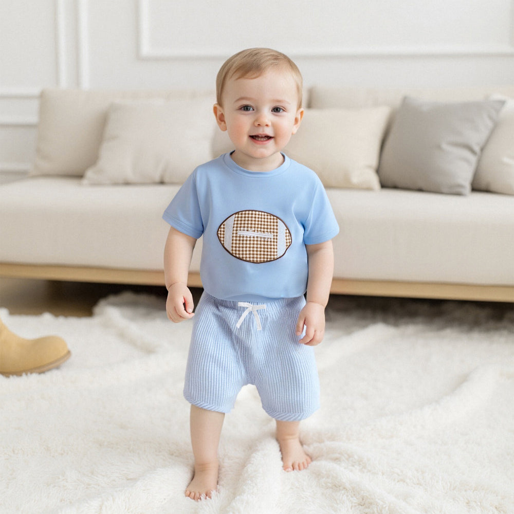 Touchdown Zomerset Jongens | T-shirt met Rugbybal & Lichtblauwe Short | Katoen & Polyester | 6mnd–4jr | Sportieve Babyoutfit