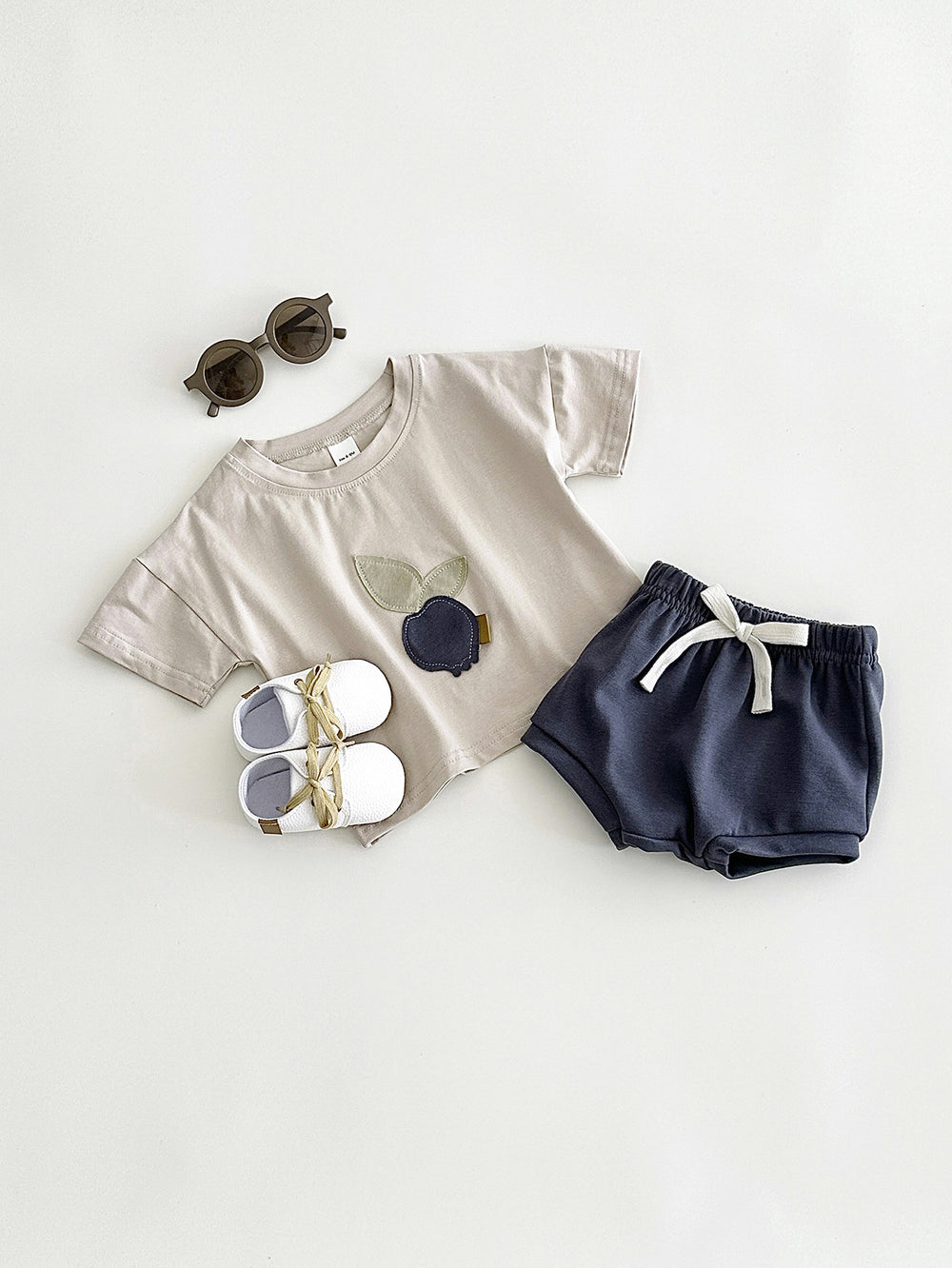 Zomer Kledingset T-shirt Perzik + Korte Broek Jogging - Little Pebble Set Unisex, Beige/Blauw, Katoen, Maat 0-3 Jaar
